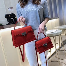 Load image into Gallery viewer, Luxury Hard Rivet PVC Handbag
